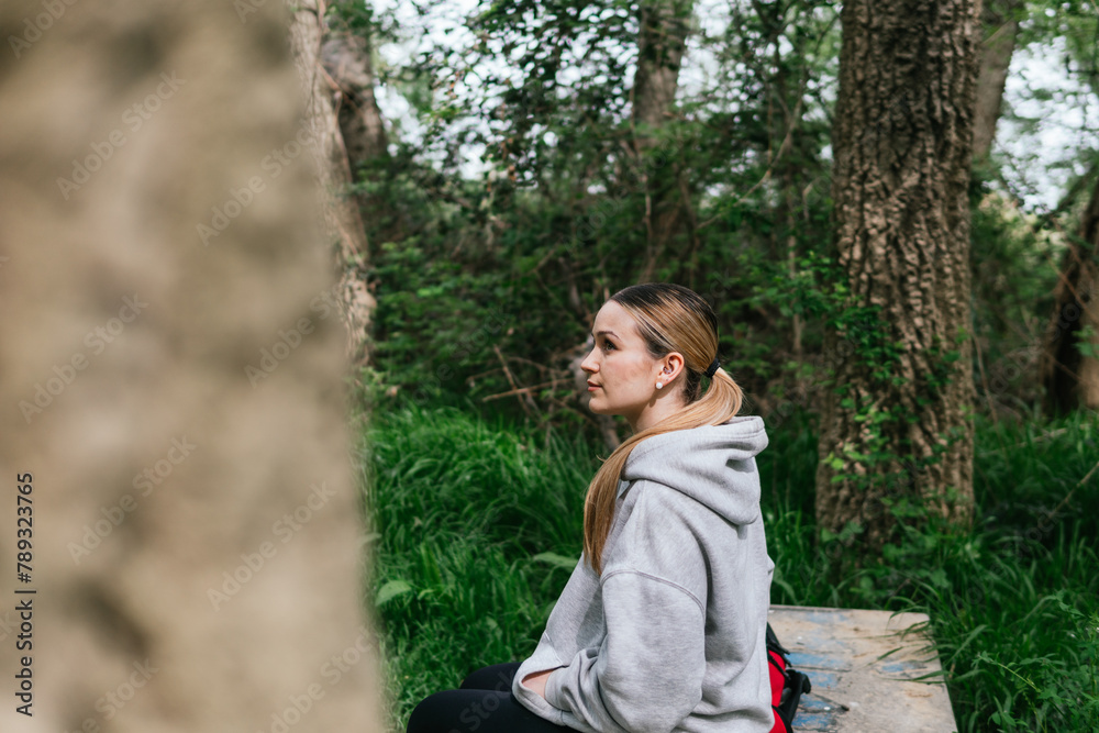 Woman taking a break on a nature trip