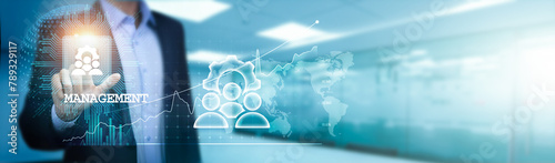 Management, like a skilled businessman, touches a circuit board of opportunities, navigating the intricate pathways on the global network, overseeing the flow and direction of organizational success.