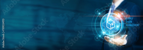 Businessman hand-holding supply chain management icons with logistics, distribution, network connections. Facilitating efficient and optimized growth of production, distribution, and retail businesses