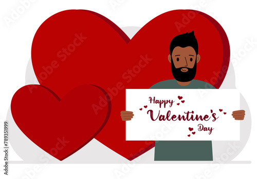 A man holds a Happy Valentine's Day greeting against a background of red hearts.