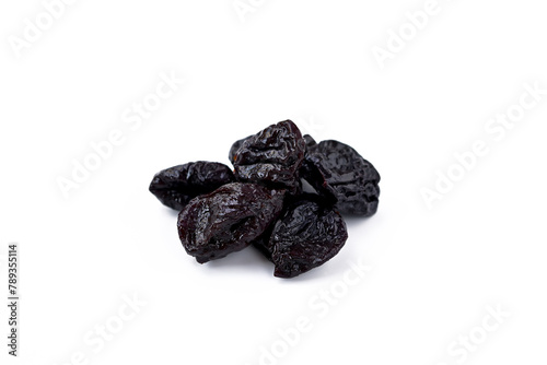 stack of dried prunes isolated on white background