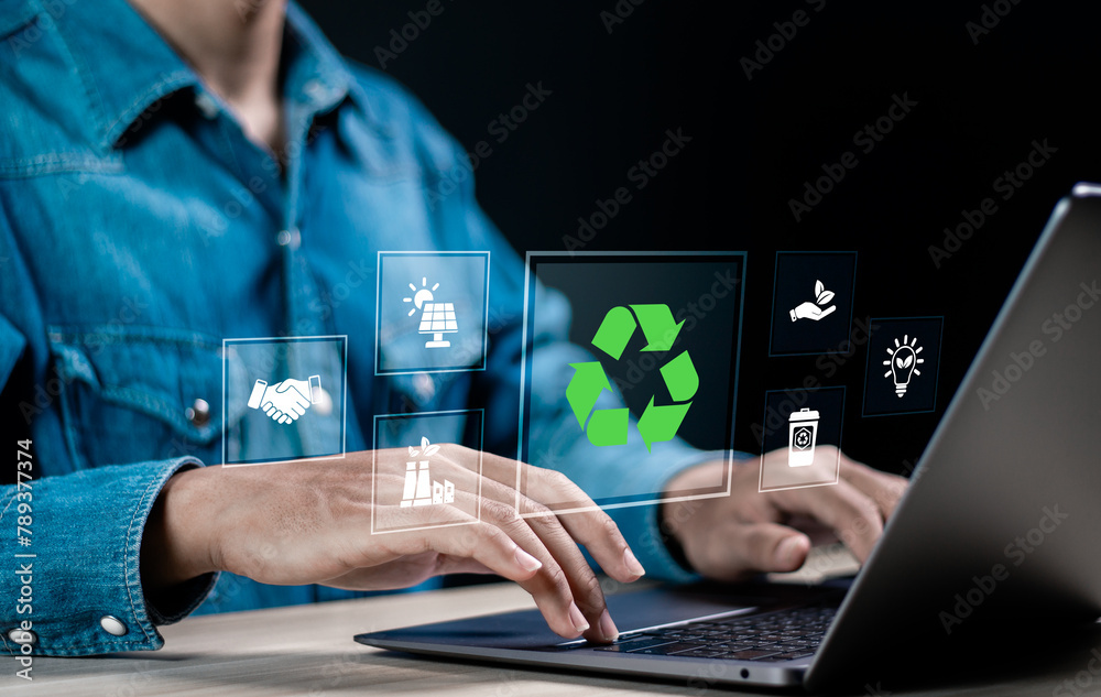 ESG environmental, social and governance. Person using laptop with ESG icon on virtual screen for world sustainable environment concept. ESG environmental, social and governance. Person using laptop with ESG icon on virtual screen for world sustainable environment concept.