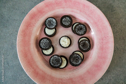 Lunar phases illustrated with cream cookies.