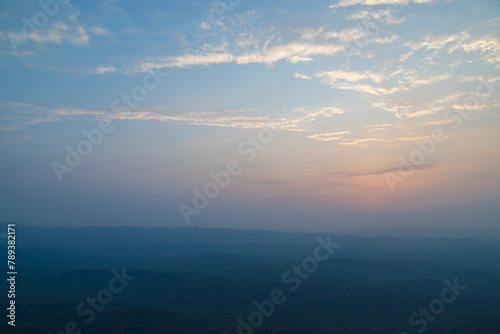 A view of the green hills in the evening  that surround the village of Bualpui in Lung Nupa Mizoram India. photo