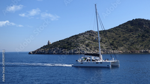Sail boats near picturesque village of Poros island, Saronic Gulf, Greece