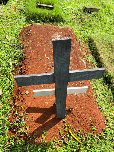 Cemetery with wooden crosses. Memorial Crosses. Wooden christian crosses on gravesite in cemetery.