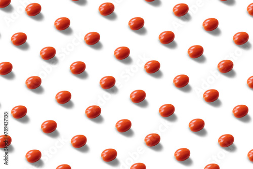 A pattern of ripe red tomatoes arranged in circles on a white background, reminiscent of a vibrant and fresh ingredient in cuisine