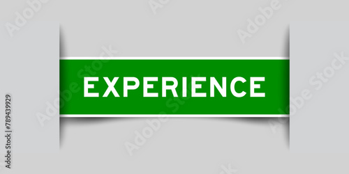 Green color square label sticker with word experience that inserted in gray background