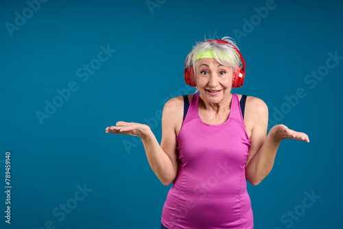 Surprised Senior Woman with Wireless Headphones