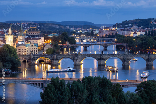Prague bridges over river moldau in evening twilight , Czech Republic