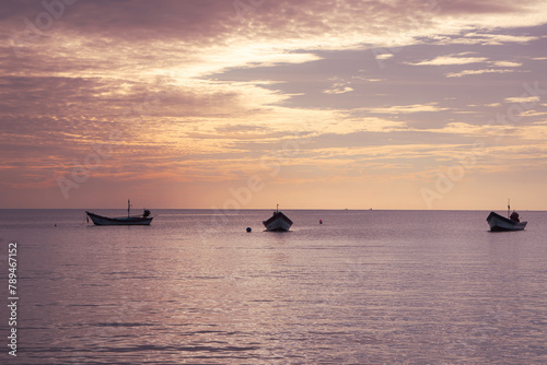 Fishing boats at sunset off the coast of Koh Phangan