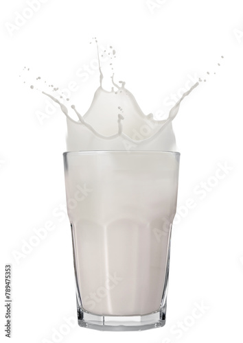 Bild auf Leinwand Milk splashing out of glass isolated on white