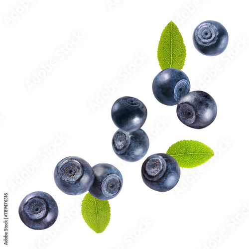 Fresh ripe bilberries and green leaves falling on white background © New Africa