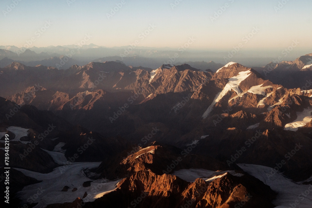 Aerial view of the Andes mountain range at sunrise.