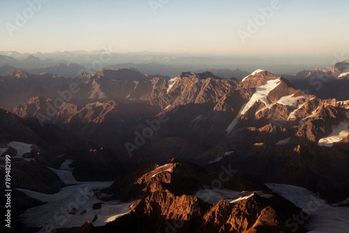 Aerial view of the Andes mountain range at sunrise.