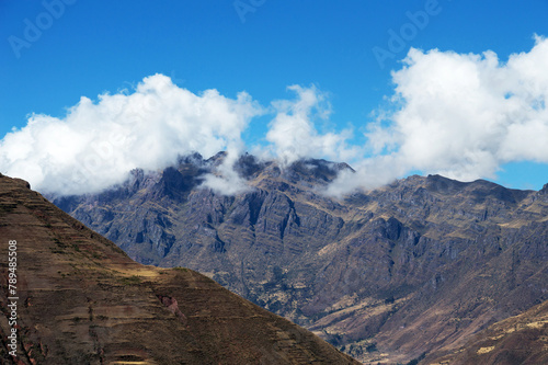 Andes mountains touched by clouds on a sunny day