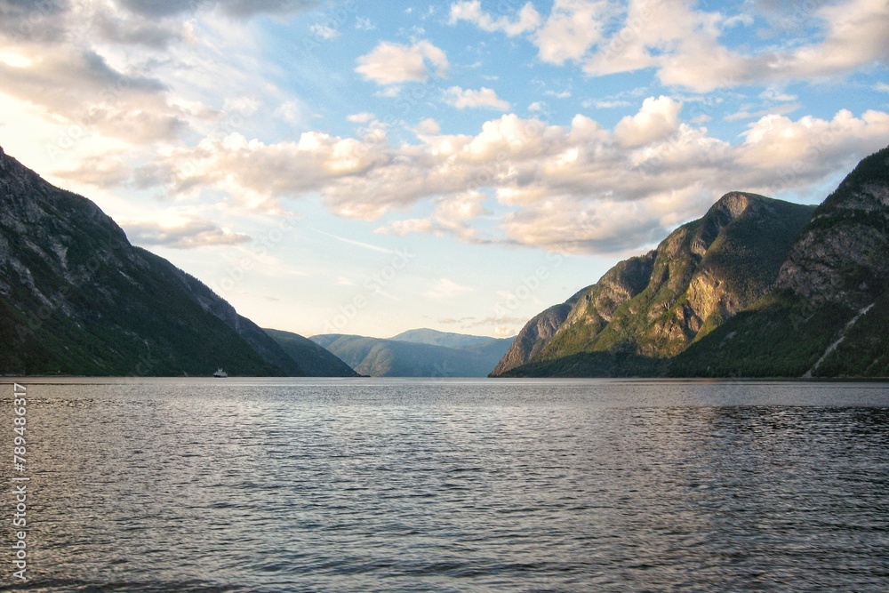 View of Geiranger fjord from the boat, Western fjords, Norway. Hardanger fjord landscape. Scandinavian mountains of Sunnylvsfjorden canyon View of Geiranger fjord from the boat, Western fjords, Norway. Hardanger fjord landscape. Scandinavian mountains of Sunnylvsfjorden canyon
