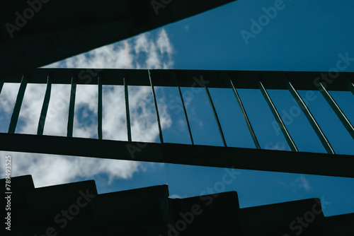 Photography bottom view of the staircase and blue sky