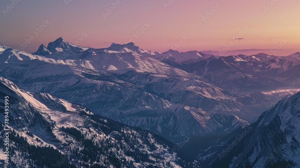 View of a mountain range landscape with snow on the peaks