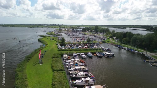 Aerial drone view of start island in Frisian lake near Sneek during festival, Sneekweek, inshore sailing regatta race watersport photo