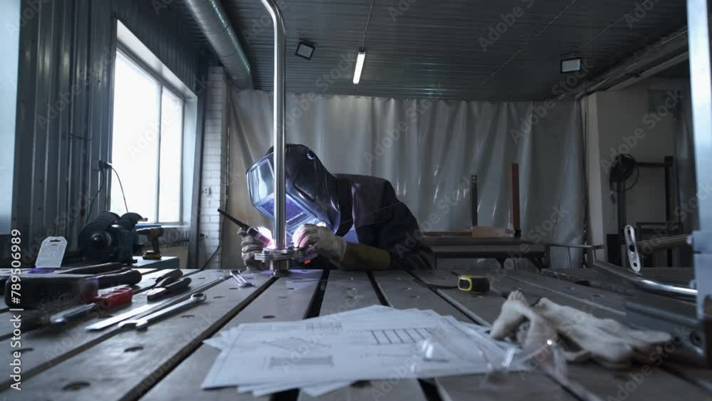 manual welding of metal with plasma in production