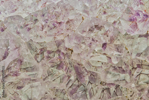 Purple amethyst geode inside, raw quartz crystals mineral precious gemstones. photo