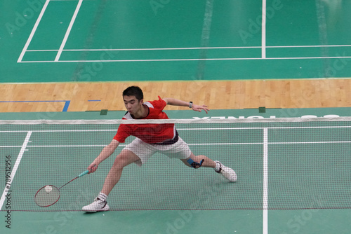 A very focused player who plays single badminton © Jang Jang