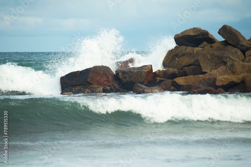 waves breaking on rocks