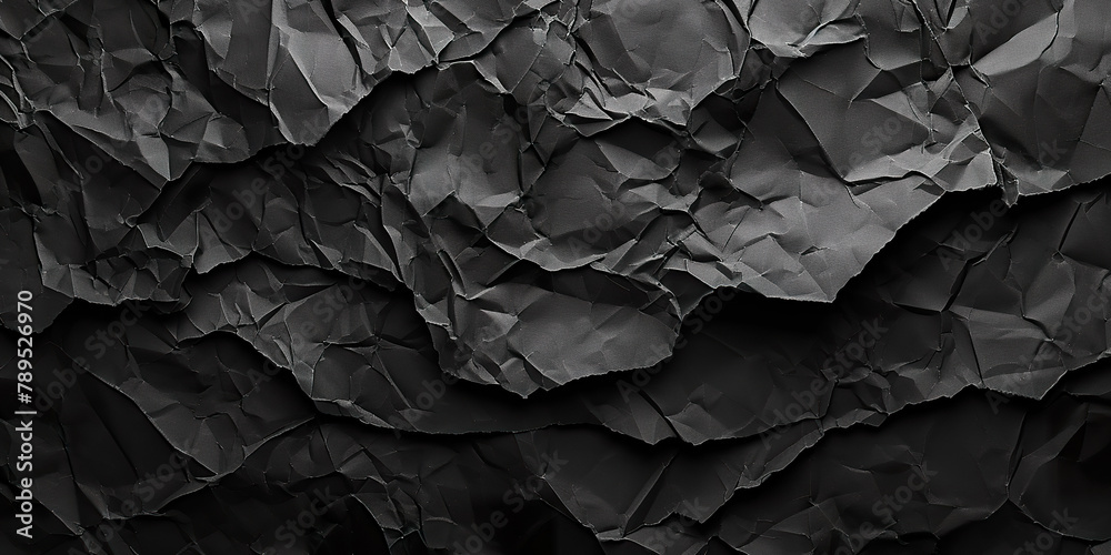 Black crumpled paper texture. Crumpled black paper