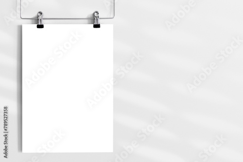 Png blank paper mockup hung with 2 clippers on white background