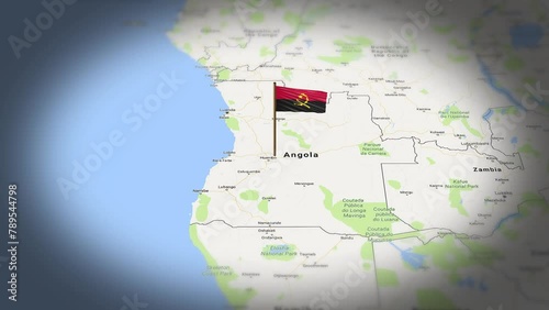 Angola flag showing on world map with 3d animation photo