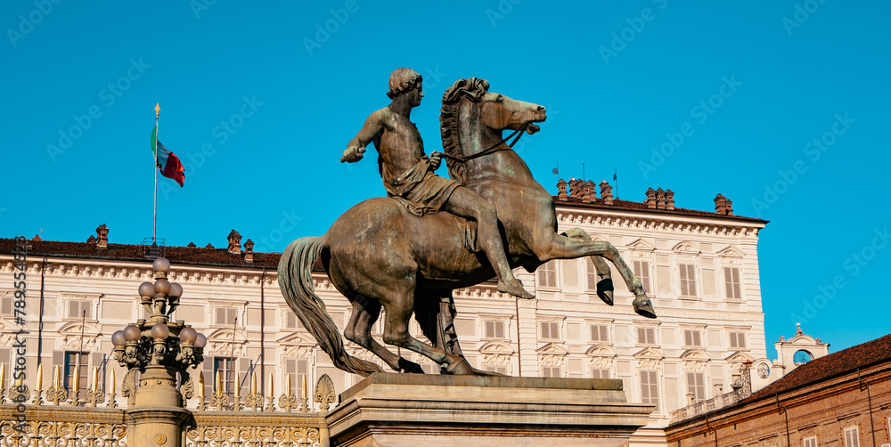 Famous statue in downtown Turin with blue sky