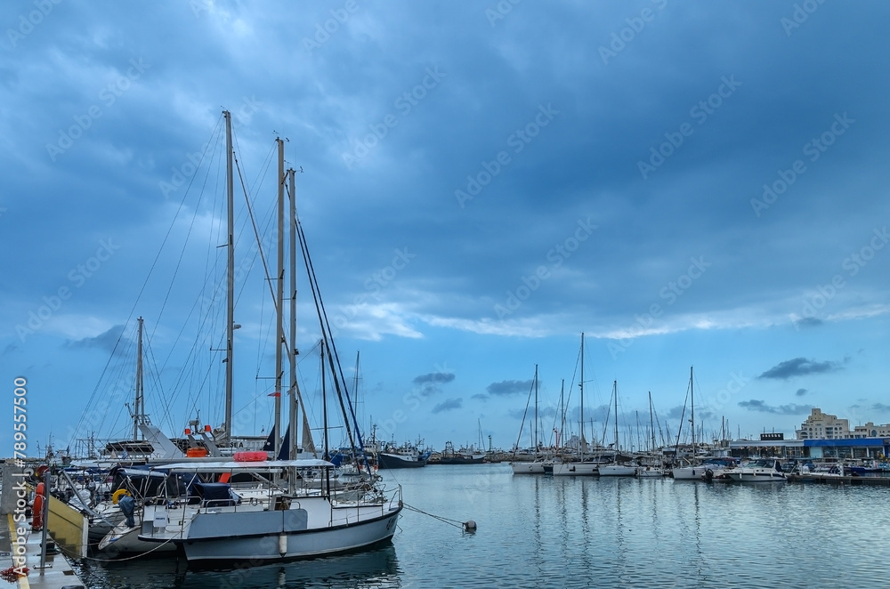 yachts and ships in the port in Limassol Cyprus in spring cloudy