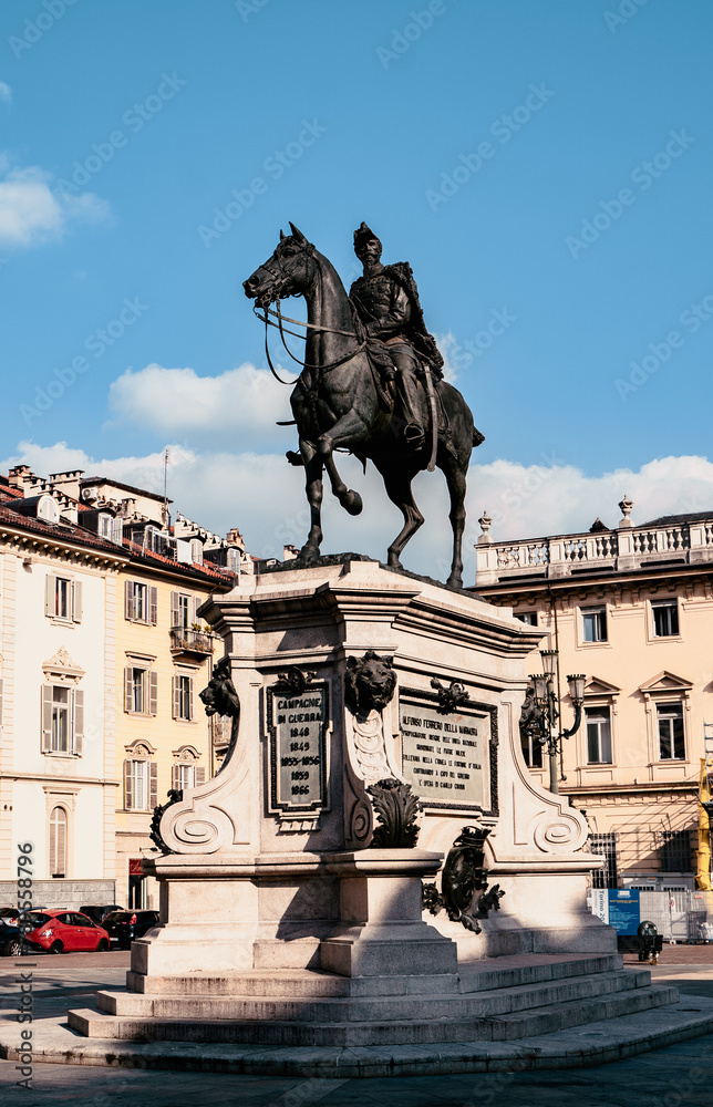 Famous statue in downtown Turin with blue sky