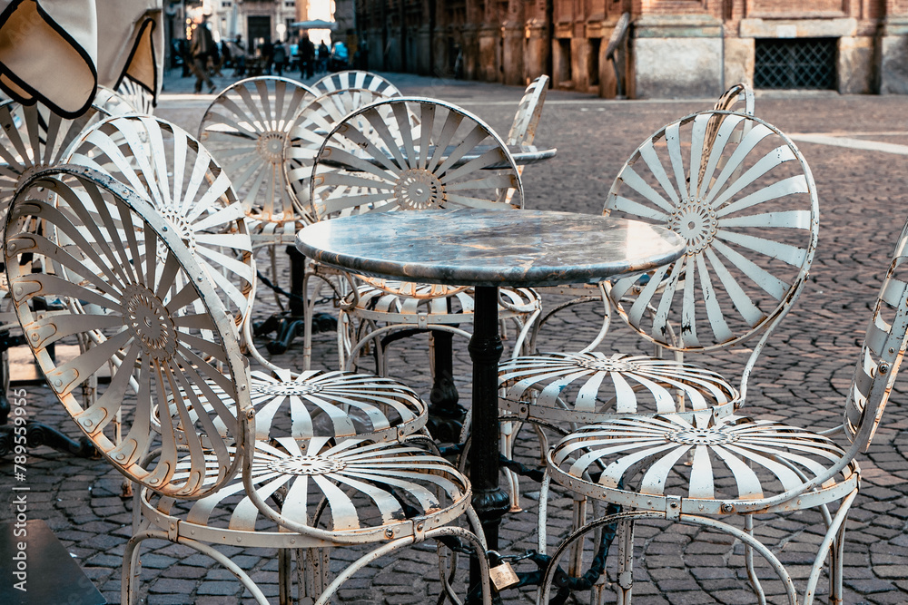 Empty restaurant table, downtown Turin