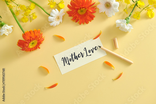 Beautiful flowers and a greeting card  photo