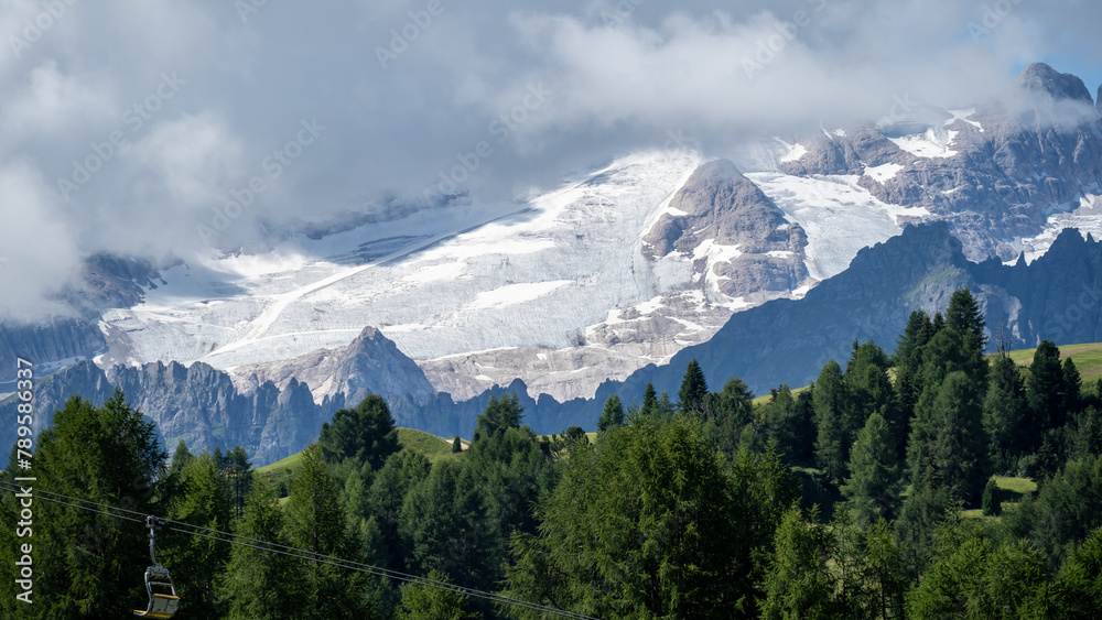 Amazing landscape to the Marmolada and its glaciers during summer time. It is the highest mountain of the Dolomites. Italian alps