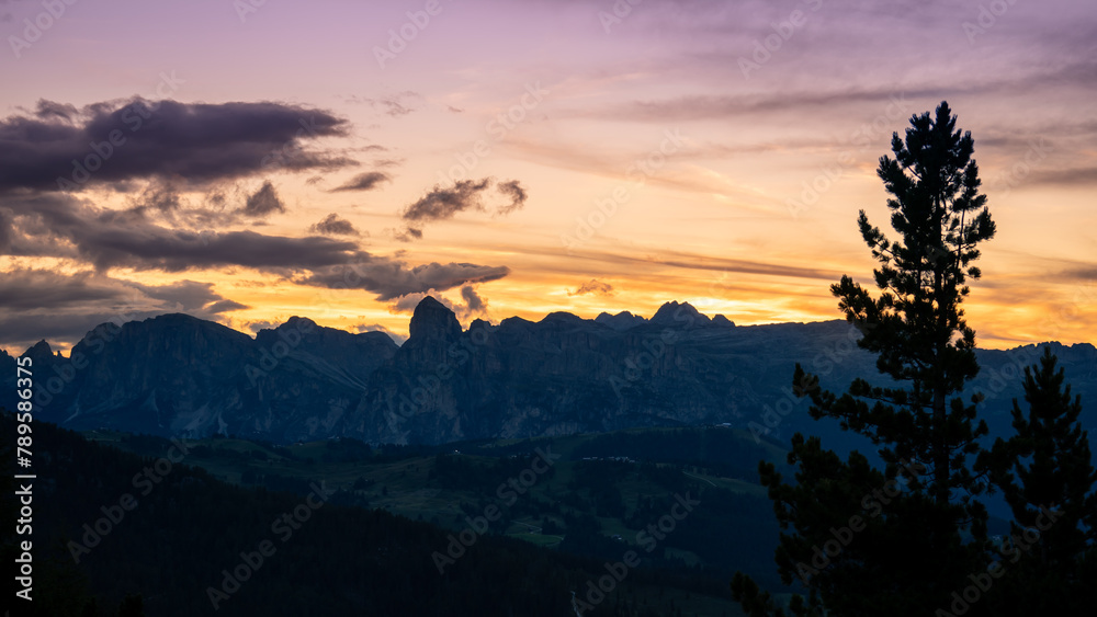 Dolomites, Italy. Sunset backlighting of the peaks of the Dolomites in the summer time