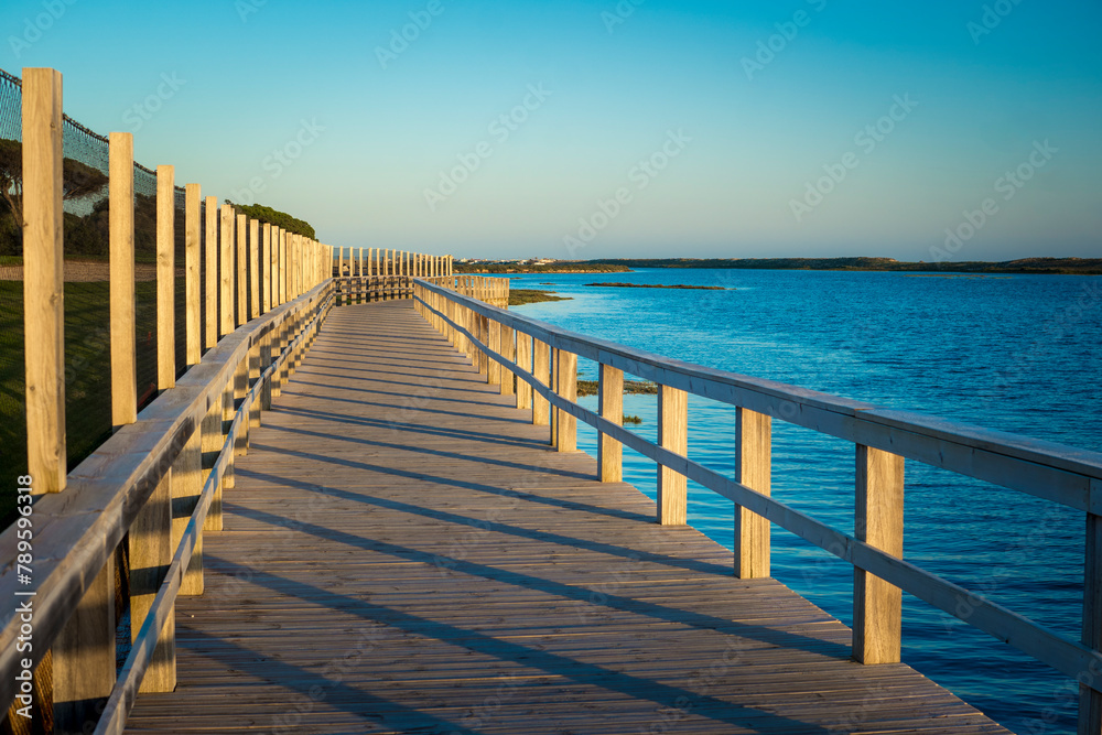 View on Rio Formosa wooden boardwalk near Faro in the Algarve, Portugal