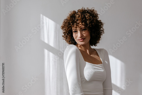Cheerful elegant woman in studio