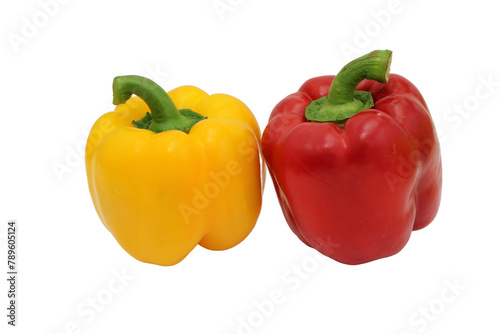 Yellow and red bell peppers on a white background, essential food ingredients