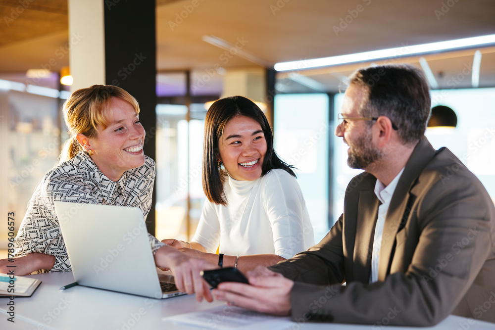 Financial advisors working on project in office Financial advisors working on project in office