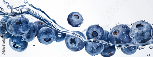 Blueberries Splashing in Water on White Background
 photo