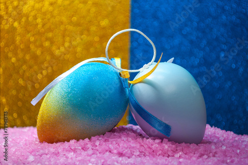 Colorful Easter Eggs on Pink Textured Background