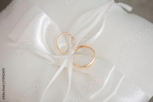 spouses rings on the pillow photo