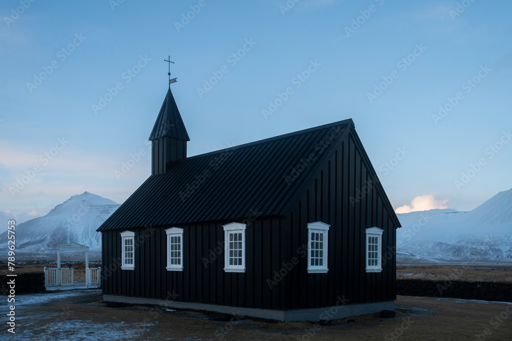 A black church in Iceland in winter