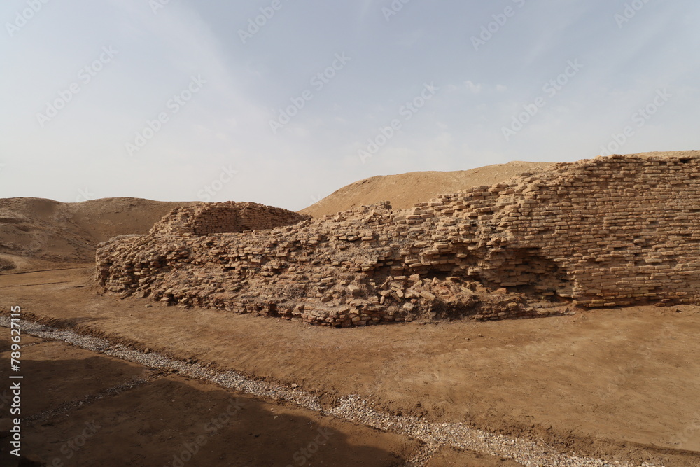 Antiquities of lagash in Iraq and Ancient ruins with cloudy sky 4000 years ago . old wall Antiquities of lagash in Iraq and Ancient ruins with cloudy sky 4000 years ago . old wall