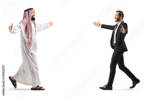 Saudi arab man in islamic clothes meeting a and greeting a businessman