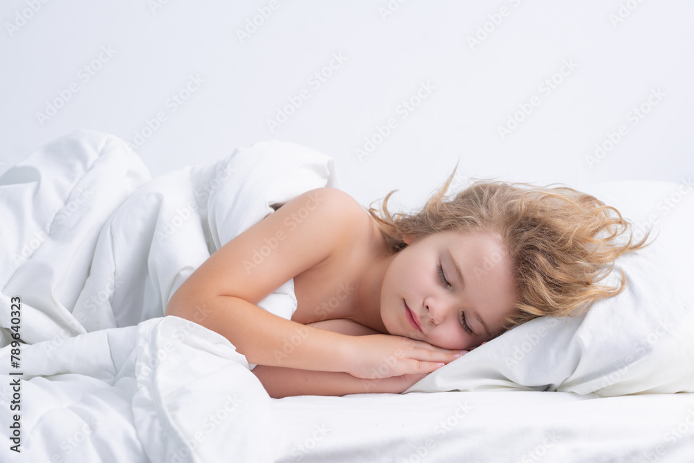 Little boy sleeping in bed. Cute kid sleeping well alone in bed under blanket. Kid lying on comfort pillow, adorable small child rest asleep, enjoy good healthy sleep or nap. Little boy sleeping in bed. Cute kid sleeping well alone in bed under blanket. Kid lying on comfort pillow, adorable small child rest asleep, enjoy good healthy sleep or nap.