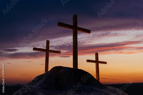 Serene Sunset Behind Three Crosses on a Hill photo